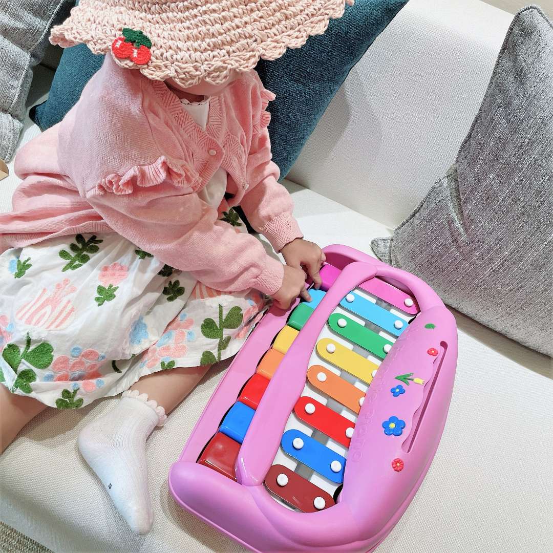 Purple musical toy piano